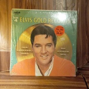 3 empty Elvis Presley album cases
